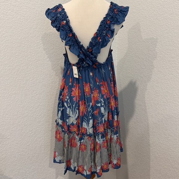 FREE PEOPLE Bali Wild Daisy Slip /
Stellar Combo size Medium - Picture 6 of 14